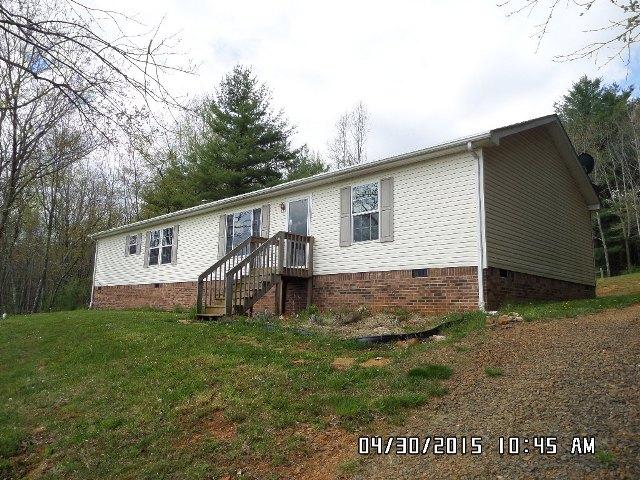 1552 Union School Road Southwest Floyd, VA 24091 - Photo 1 of 40 a view of a house with a yard