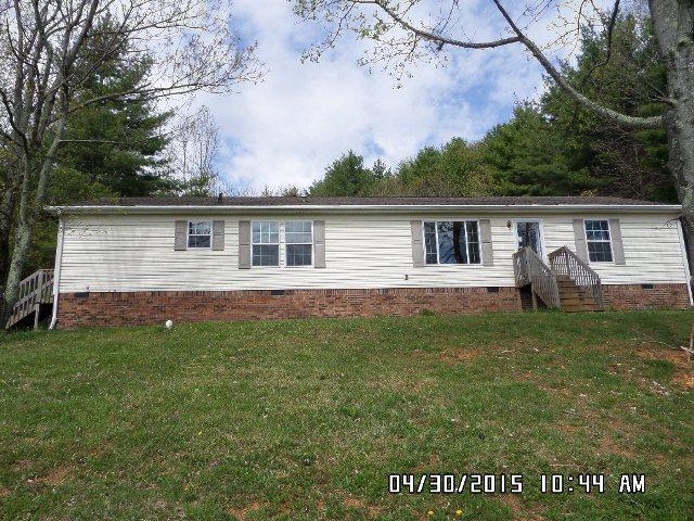 1552 Union School Road Southwest Floyd, VA 24091 - Photo 2 of 40 a view of a house with a backyard