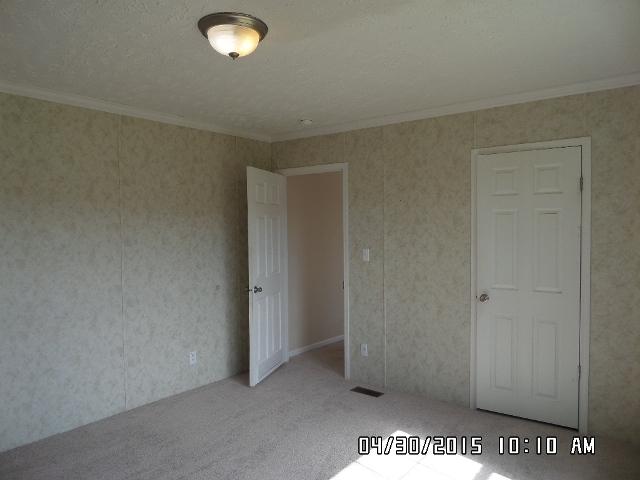 1552 Union School Road Southwest Floyd, VA 24091 - Photo 19 of 40 an empty room with a door