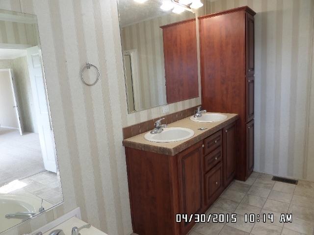 1552 Union School Road Southwest Floyd, VA 24091 - Photo 22 of 40 a bathroom with a sink and a mirror