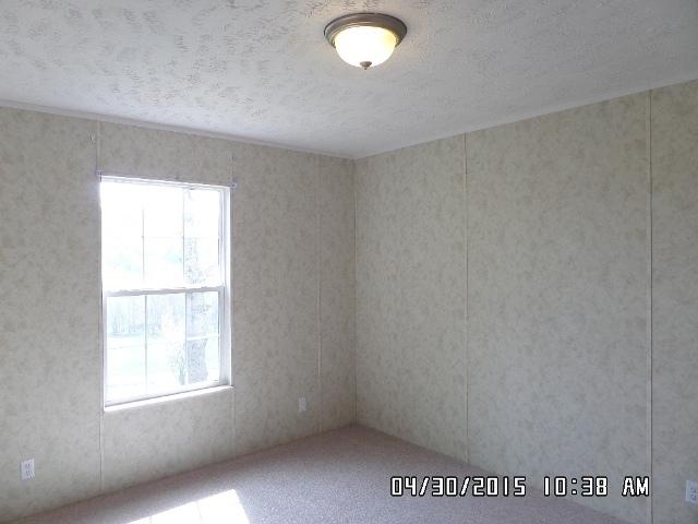 1552 Union School Road Southwest Floyd, VA 24091 - Photo 27 of 40 an empty room with a window