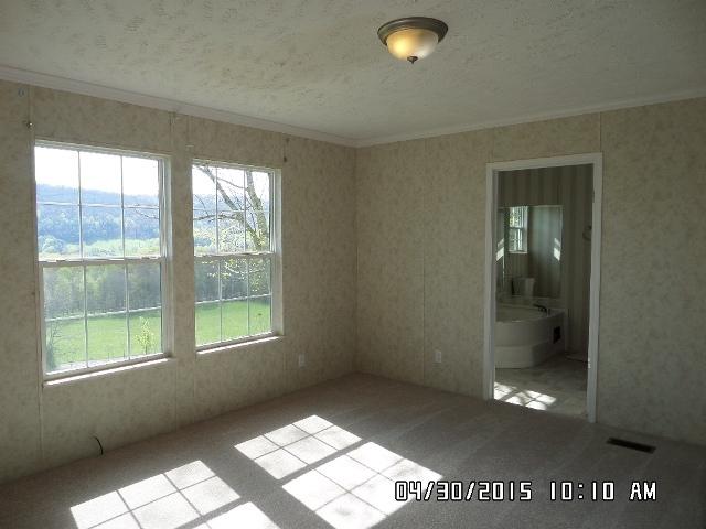 1552 Union School Road Southwest Floyd, VA 24091 - Photo 4 of 40 a view of an empty room and window