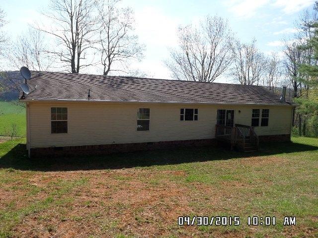 1552 Union School Road Southwest Floyd, VA 24091 - Photo 35 of 40 a front view of a house with a yard