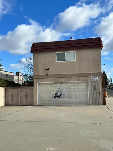 a room with furniture and gym equipment
