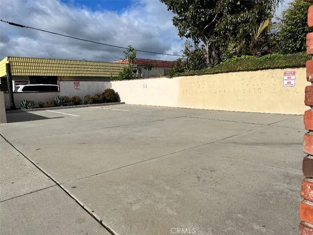 a room with lots of furniture and gym equipment