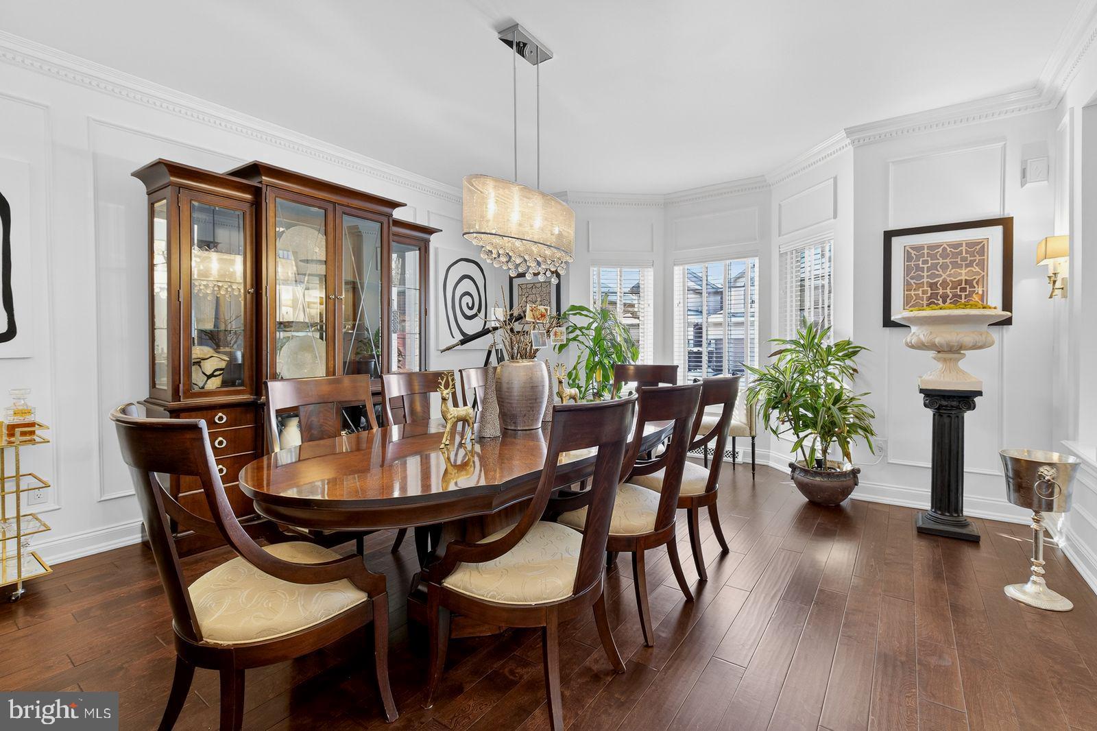 1098 Stillwood Circle Lititz, PA 17543 - Photo 8 of 46 a view of a dining room with furniture window and wooden floor