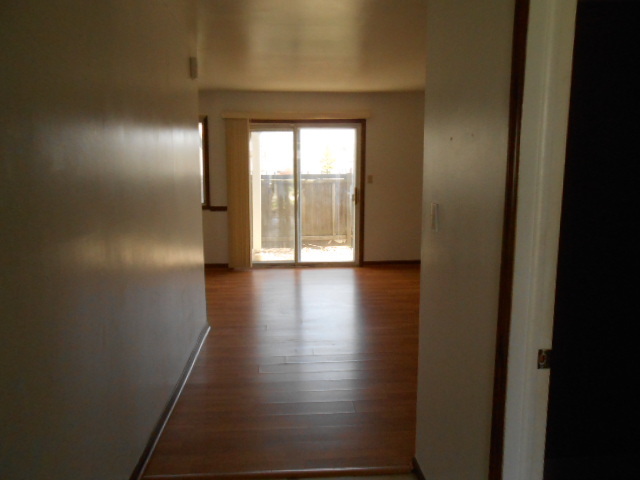 2023 Raleigh Place Hoffman Estates, IL 60169 - Photo 2 of 10 a view of a hallway with wooden floor
