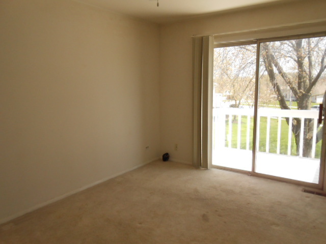 2023 Raleigh Place Hoffman Estates, IL 60169 - Photo 5 of 10 a view of an empty room with a window