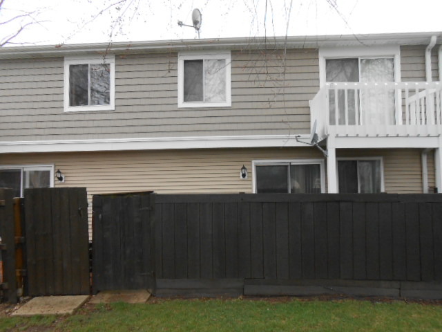 2023 Raleigh Place Hoffman Estates, IL 60169 - Photo 10 of 10 a front view of a house with a yard