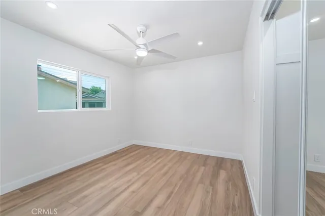 a kitchen with a sink cabinets and window