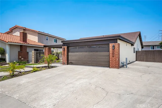 a house with a glass door and glass door
