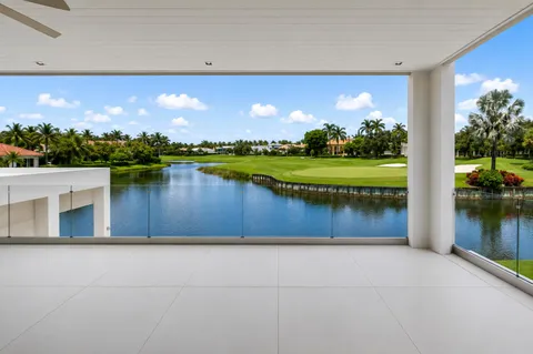 a view of a lake with a garden