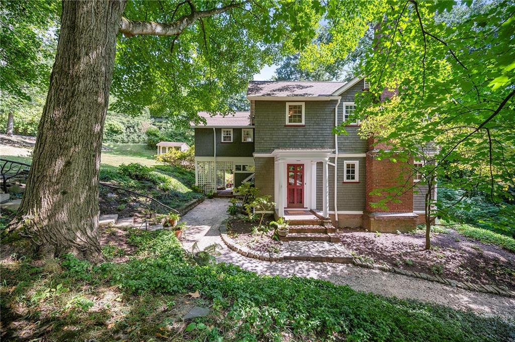 325 Sycamore Road Sewickley, PA 15143 - Photo 2 of 49 a view of a house with a yard and large tree