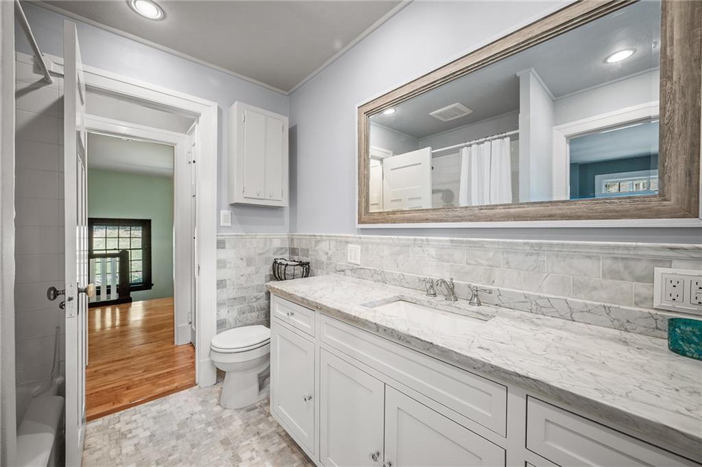 325 Sycamore Road Sewickley, PA 15143 - Photo 25 of 49 a bathroom with a sink and a mirror