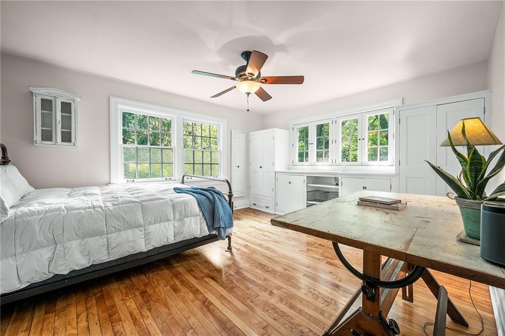 325 Sycamore Road Sewickley, PA 15143 - Photo 27 of 49 a bedroom with a bed and a table