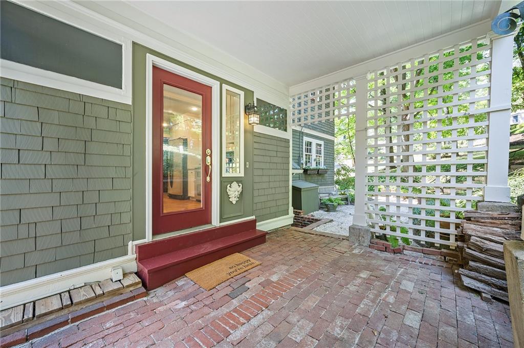 325 Sycamore Road Sewickley, PA 15143 - Photo 34 of 49 a hallway with a bench and floor to ceiling window