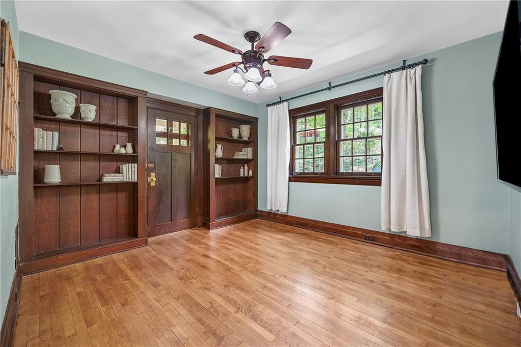 325 Sycamore Road Sewickley, PA 15143 - Photo 4 of 49 a view of an empty room with cabinet and a window