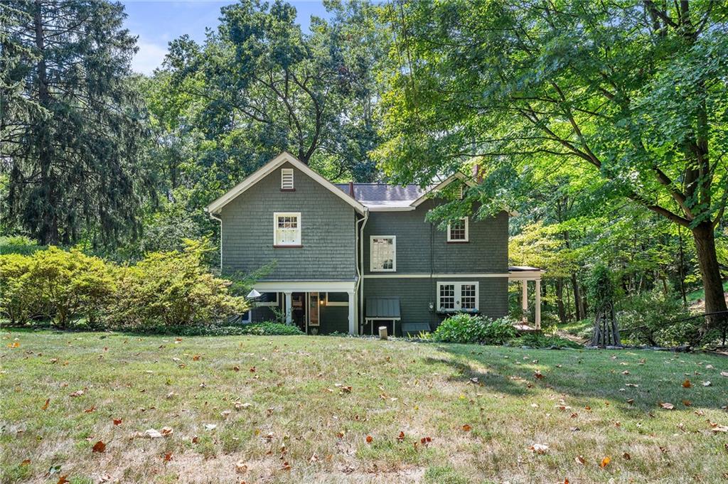 325 Sycamore Road Sewickley, PA 15143 - Photo 42 of 49 a front view of a house with a yard