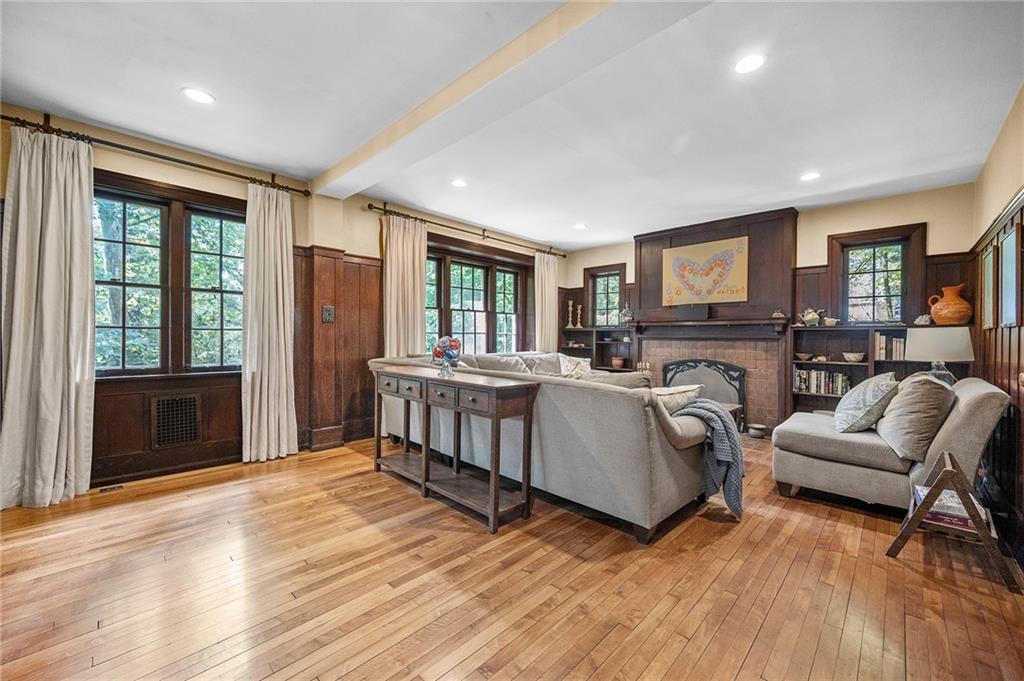325 Sycamore Road Sewickley, PA 15143 - Photo 5 of 49 a living room with furniture and a fireplace