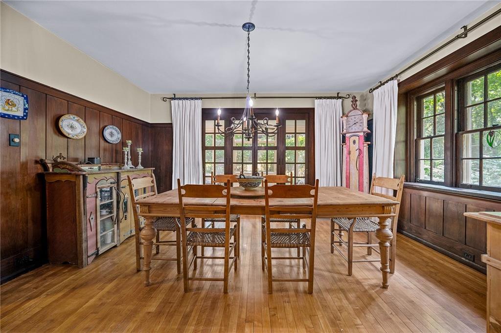 325 Sycamore Road Sewickley, PA 15143 - Photo 7 of 49 a view of a dining room with furniture window and wooden floor