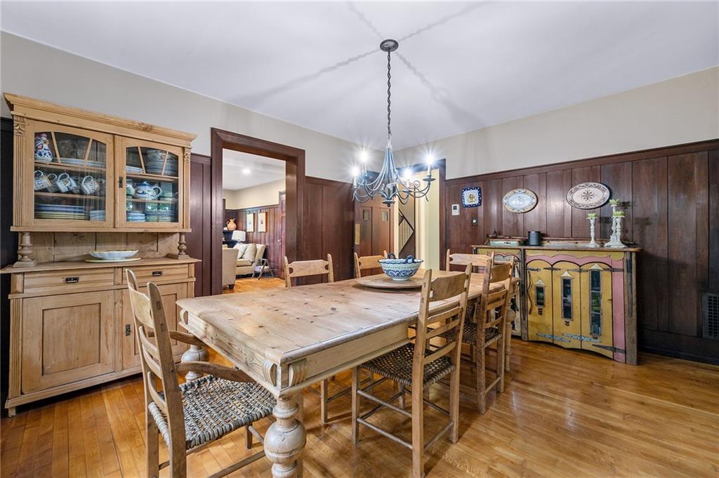 325 Sycamore Road Sewickley, PA 15143 - Photo 10 of 49 a view of a dining room with furniture and wooden floor