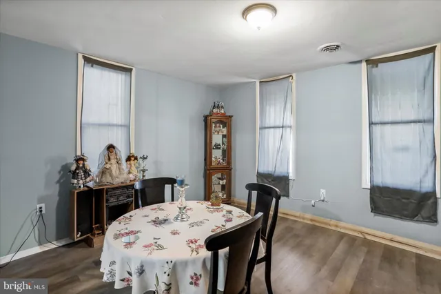 a view of a dining room with furniture