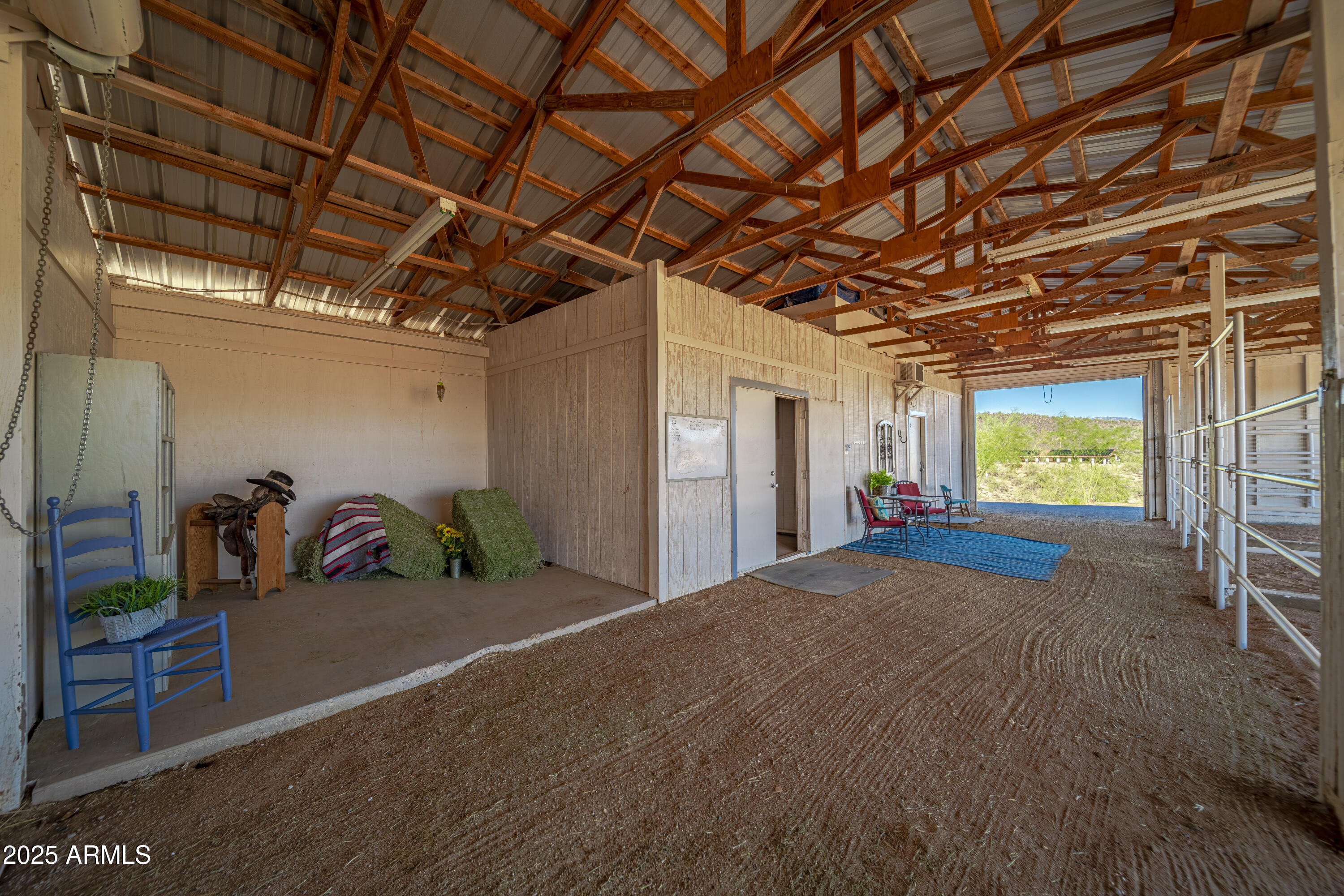 18330 Moonlight Mesa Road Wickenburg, AZ 85390 - Photo 16 of 31 a view of a room with gym equipment