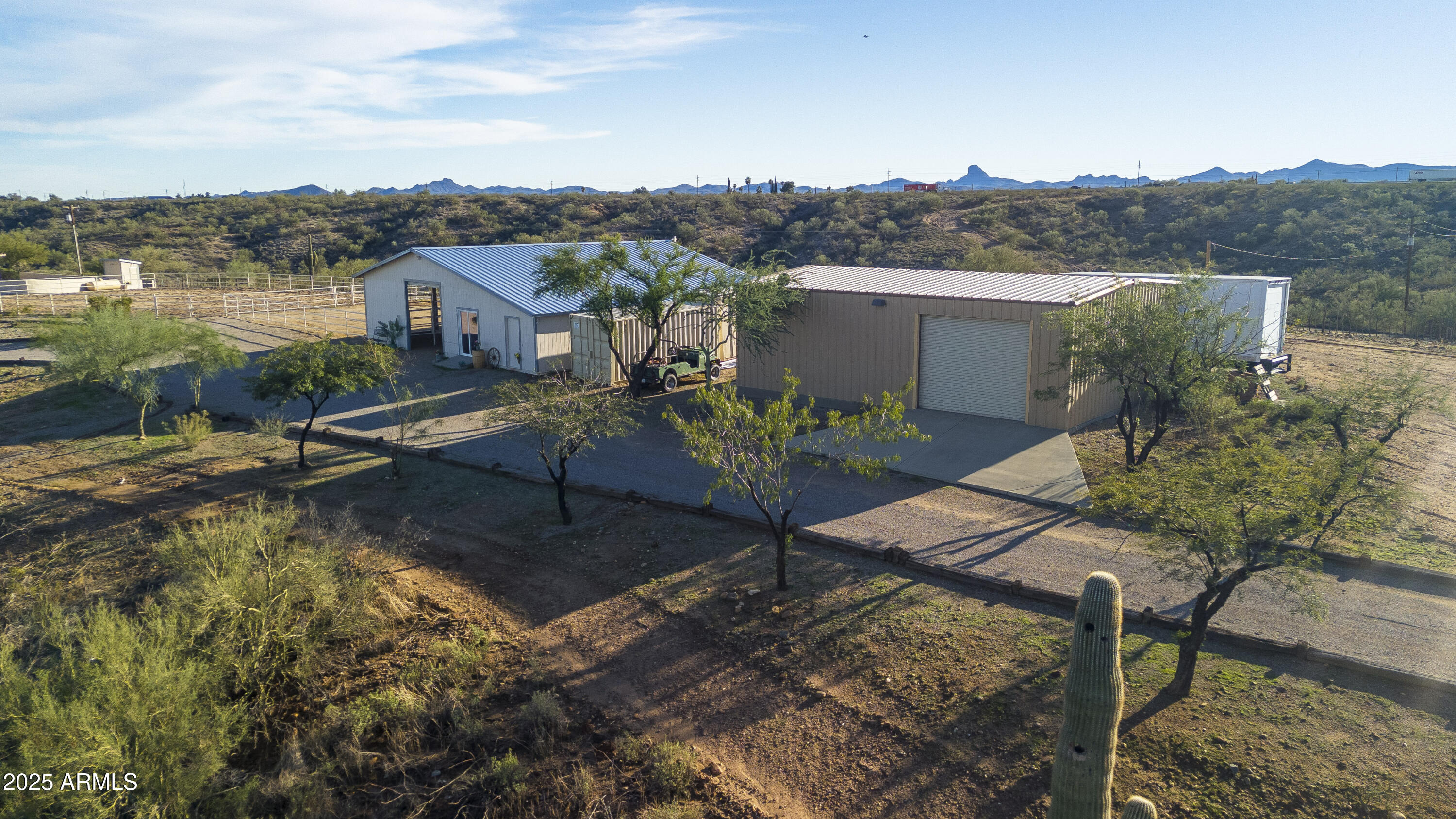 18330 Moonlight Mesa Road Wickenburg, AZ 85390 - Photo 5 of 31 a view of a swimming pool with a patio