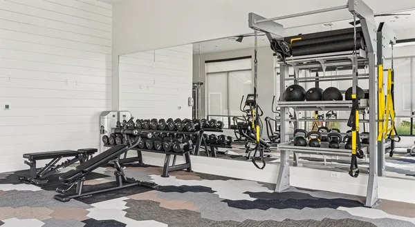 a view of a room with gym equipment