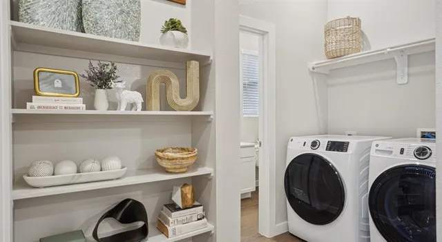 a view of dining room with washer and dryer