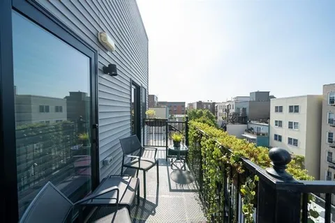 a view of outdoor sitting area with furniture