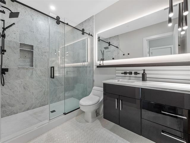 618 Madison Street, Unit 4 Hoboken, NJ 07030 - Photo 10 of 27 a bathroom with a sink toilet and shower