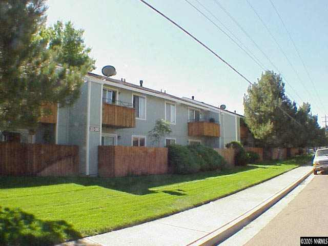 4602 Neil Road, Unit 95 Reno, NV 89502 - Photo 2 of 3 a view of a house with backyard and a tree