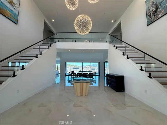 a view of entryway and kitchen