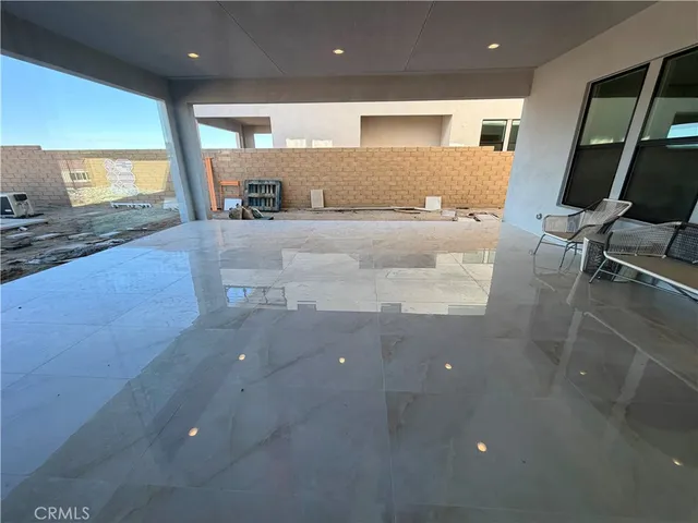 a view of a living room and bathroom