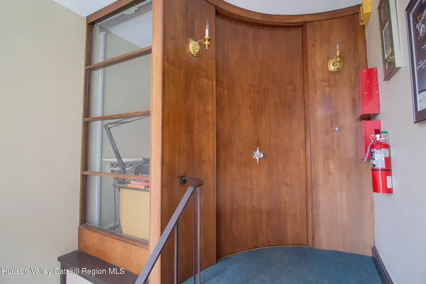 a view of elevator with hallway