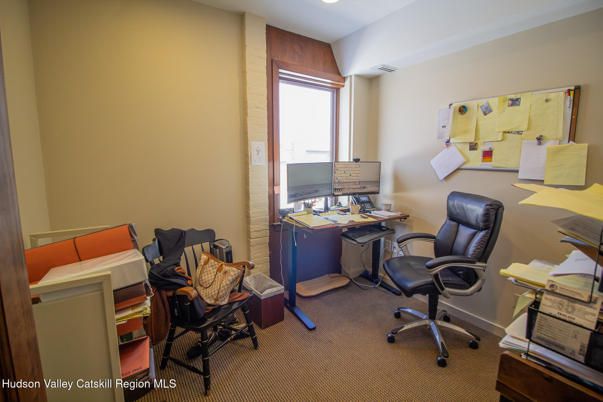 28 2nd Street Troy, NY 12180 - Photo 12 of 27 a view of a workspace with furniture and a window