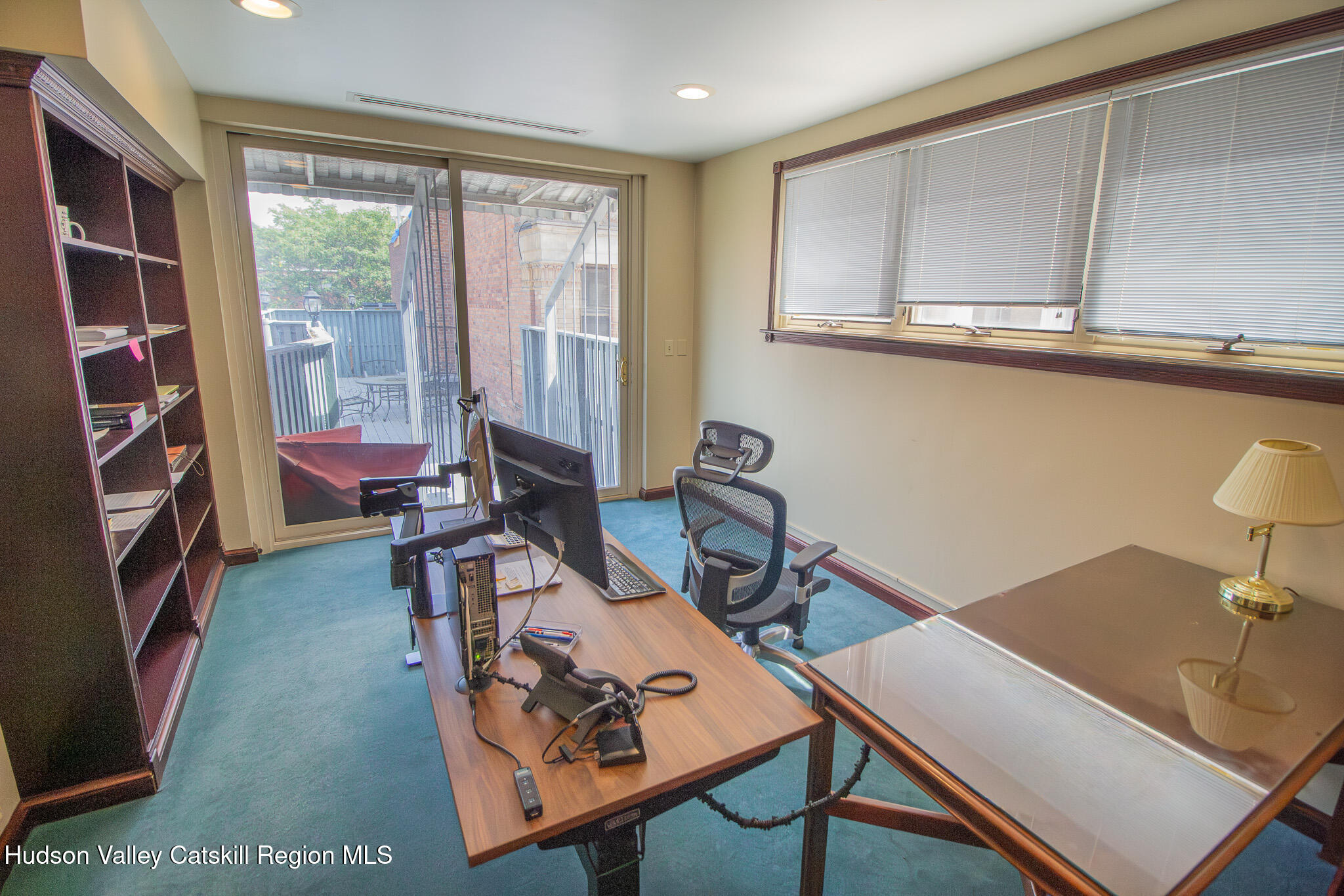 28 2nd Street Troy, NY 12180 - Photo 20 of 27 a view of a workspace with furniture and a window