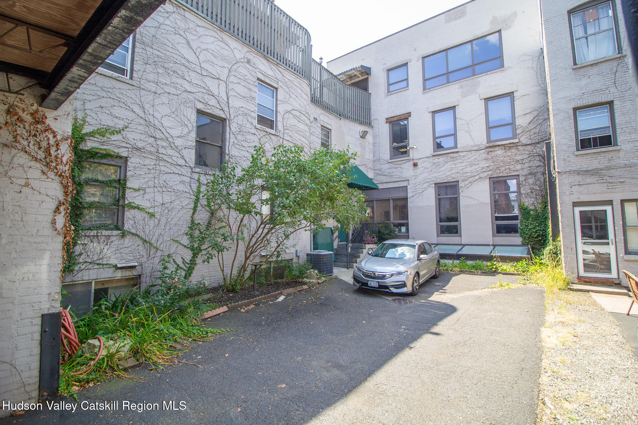 28 2nd Street Troy, NY 12180 - Photo 26 of 27 a view of a building with sitting area