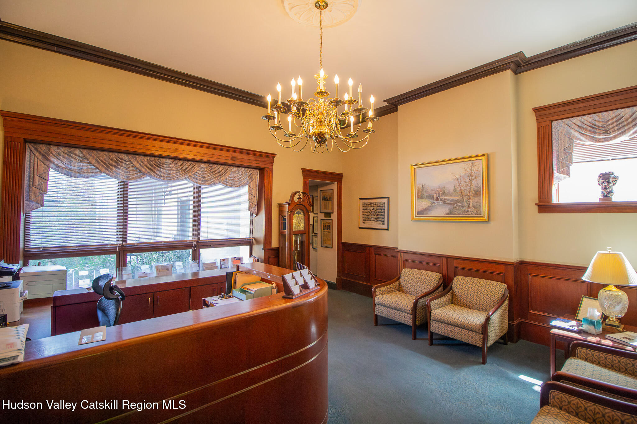 28 2nd Street Troy, NY 12180 - Photo 5 of 27 a living room with furniture and a chandelier