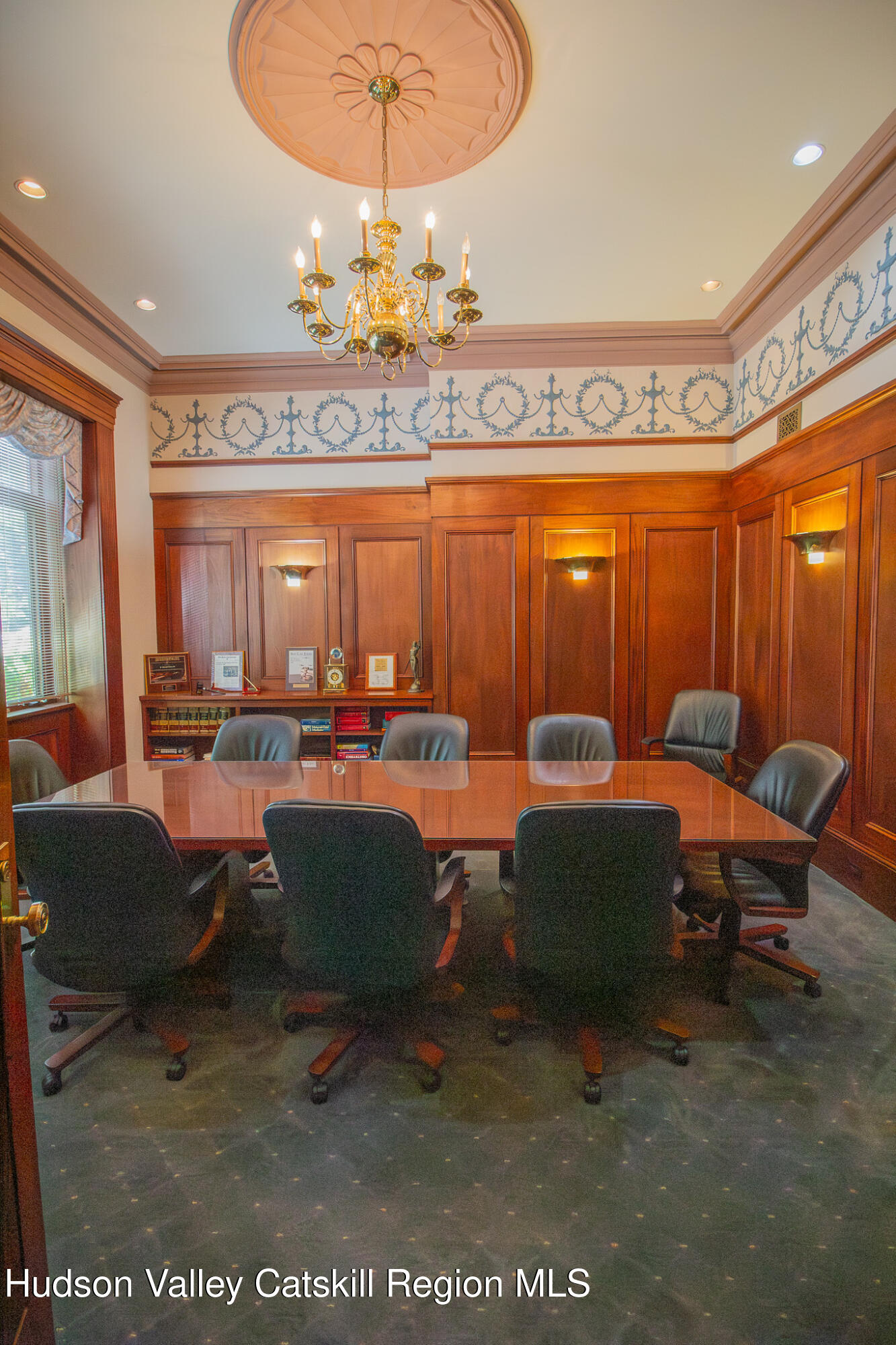 28 2nd Street Troy, NY 12180 - Photo 7 of 27 a living room with furniture a chandelier and a rug