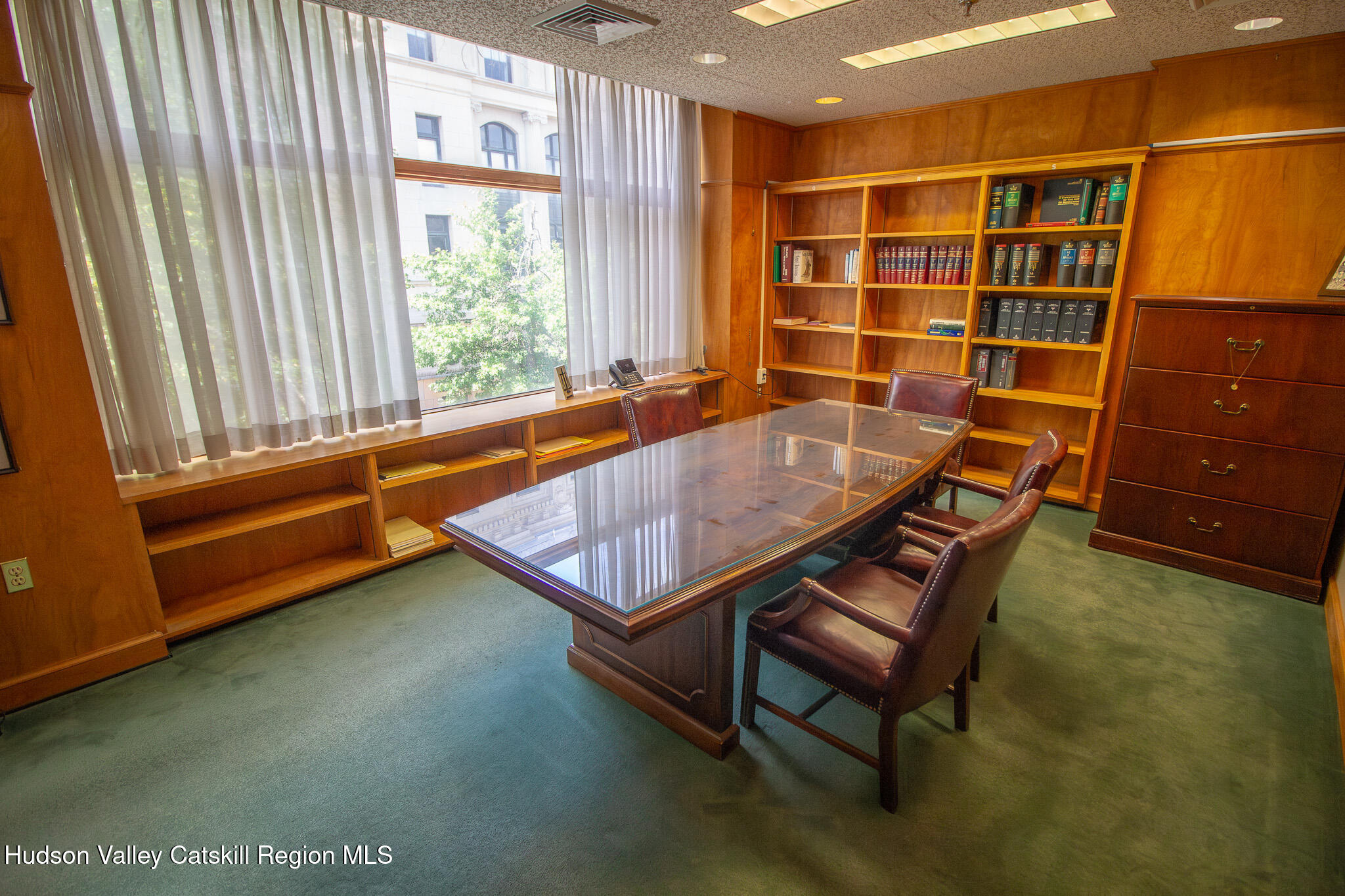 28 2nd Street Troy, NY 12180 - Photo 9 of 27 a room with windows and wooden walls