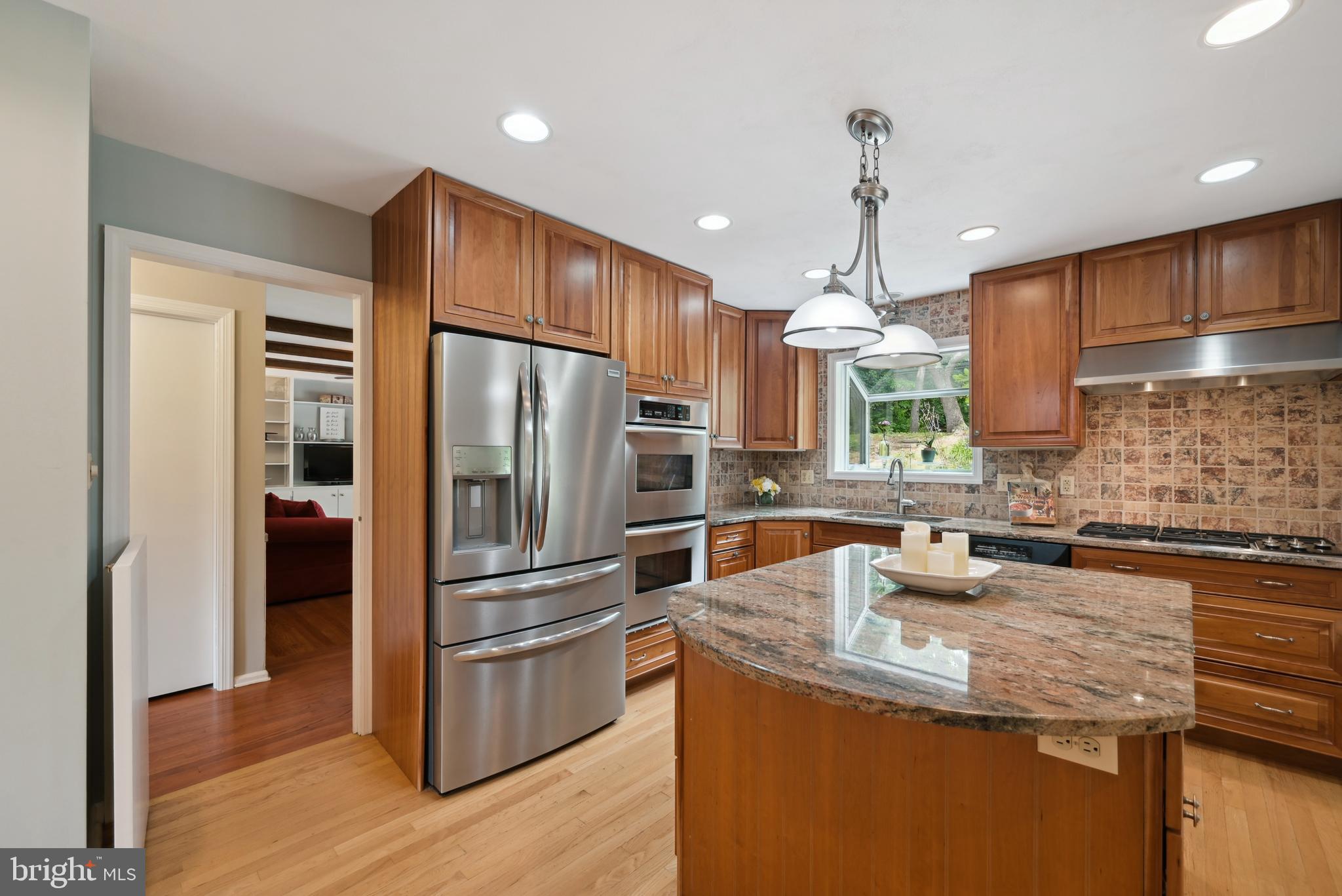 16 Fieldston Road West Windsor, NJ 08550 - Photo 11 of 34 a kitchen with stainless steel appliances granite countertop a sink refrigerator and cabinets