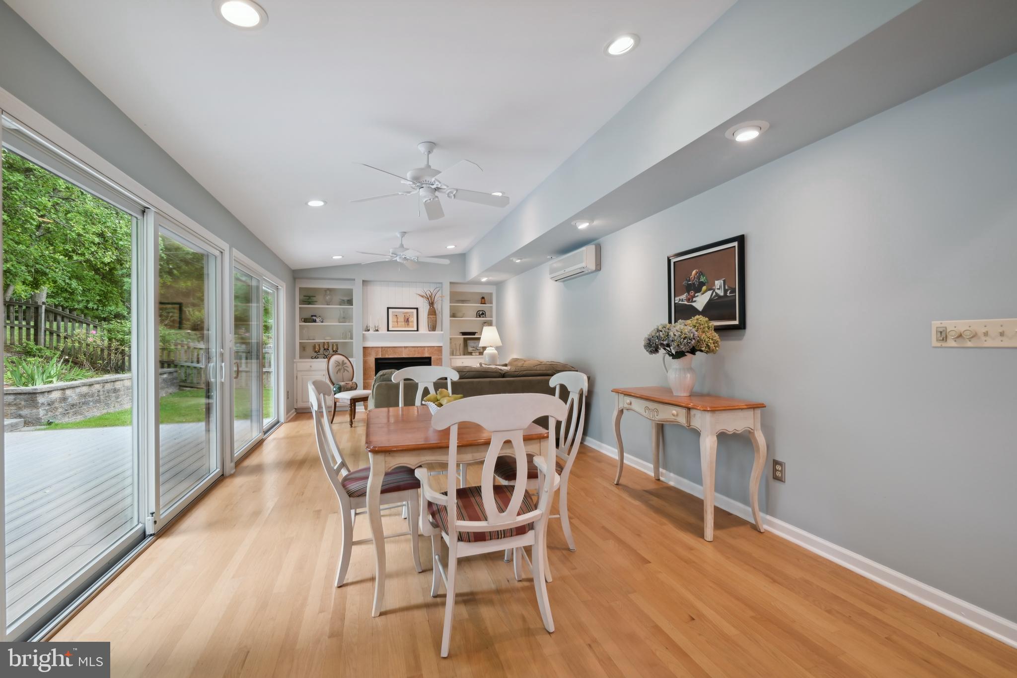 16 Fieldston Road West Windsor, NJ 08550 - Photo 14 of 34 a dining room with furniture a window and wooden floor