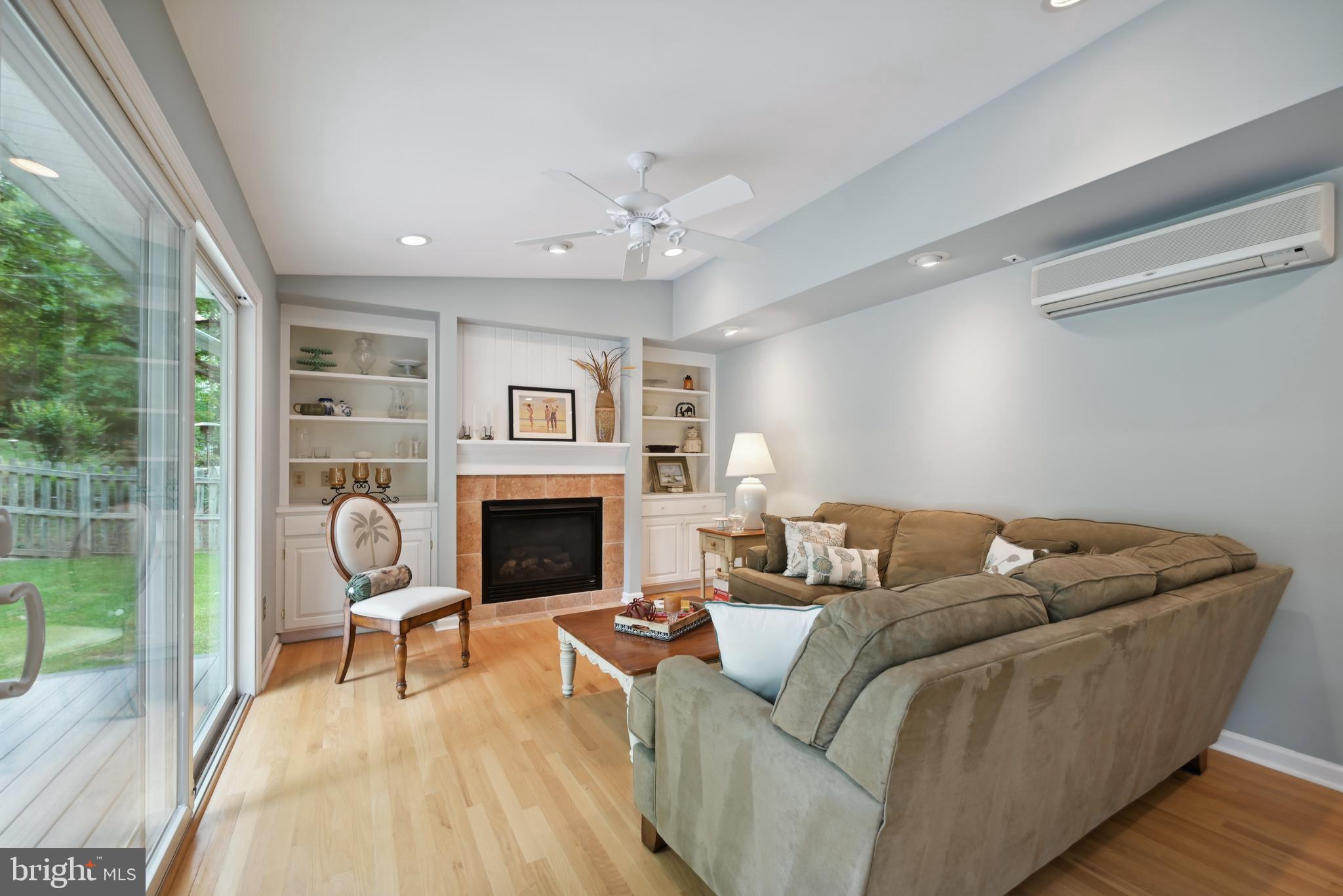 16 Fieldston Road West Windsor, NJ 08550 - Photo 15 of 34 a living room with furniture and a fireplace