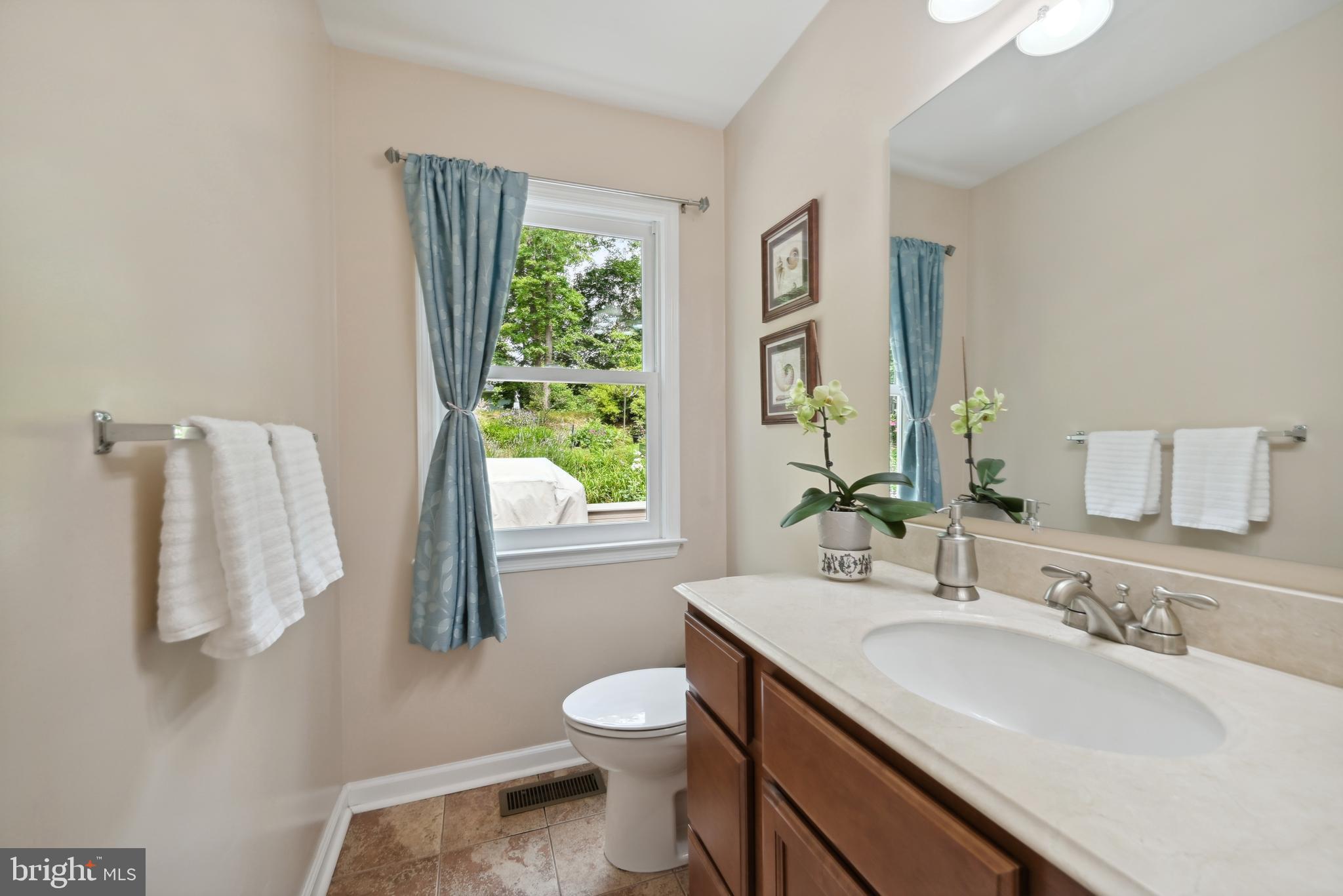 16 Fieldston Road West Windsor, NJ 08550 - Photo 19 of 34 a bathroom with a granite countertop sink toilet and mirror