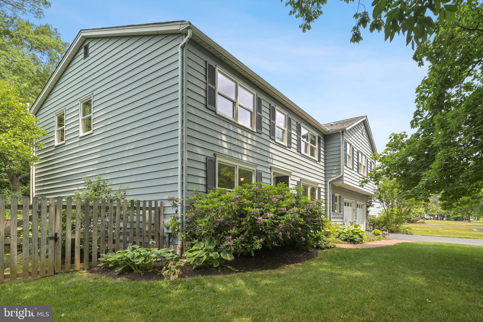 16 Fieldston Road West Windsor, NJ 08550 - Photo 2 of 34 a front view of a house with a garden