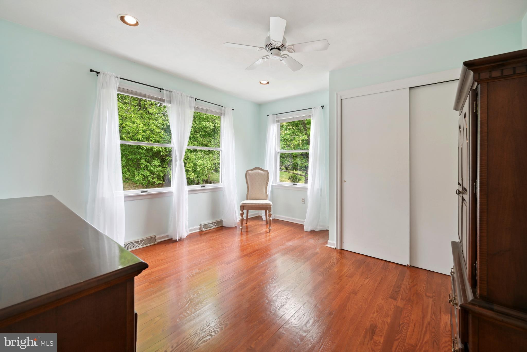 16 Fieldston Road West Windsor, NJ 08550 - Photo 28 of 34 a view of an empty room with a window and wooden floor