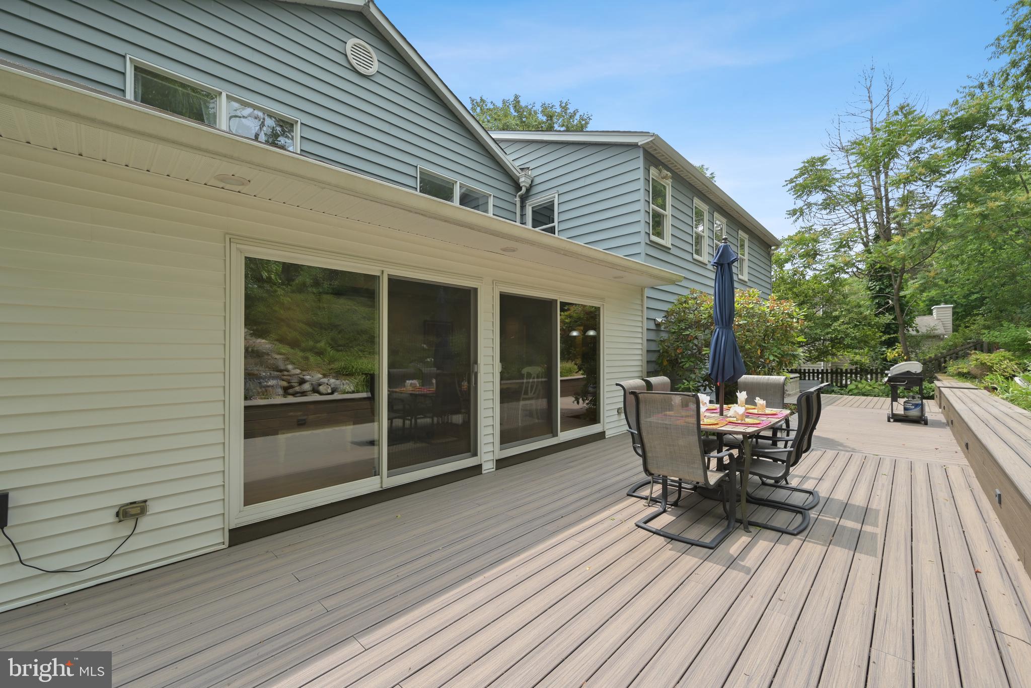 16 Fieldston Road West Windsor, NJ 08550 - Photo 31 of 34 a view of a house with backyard and sitting area