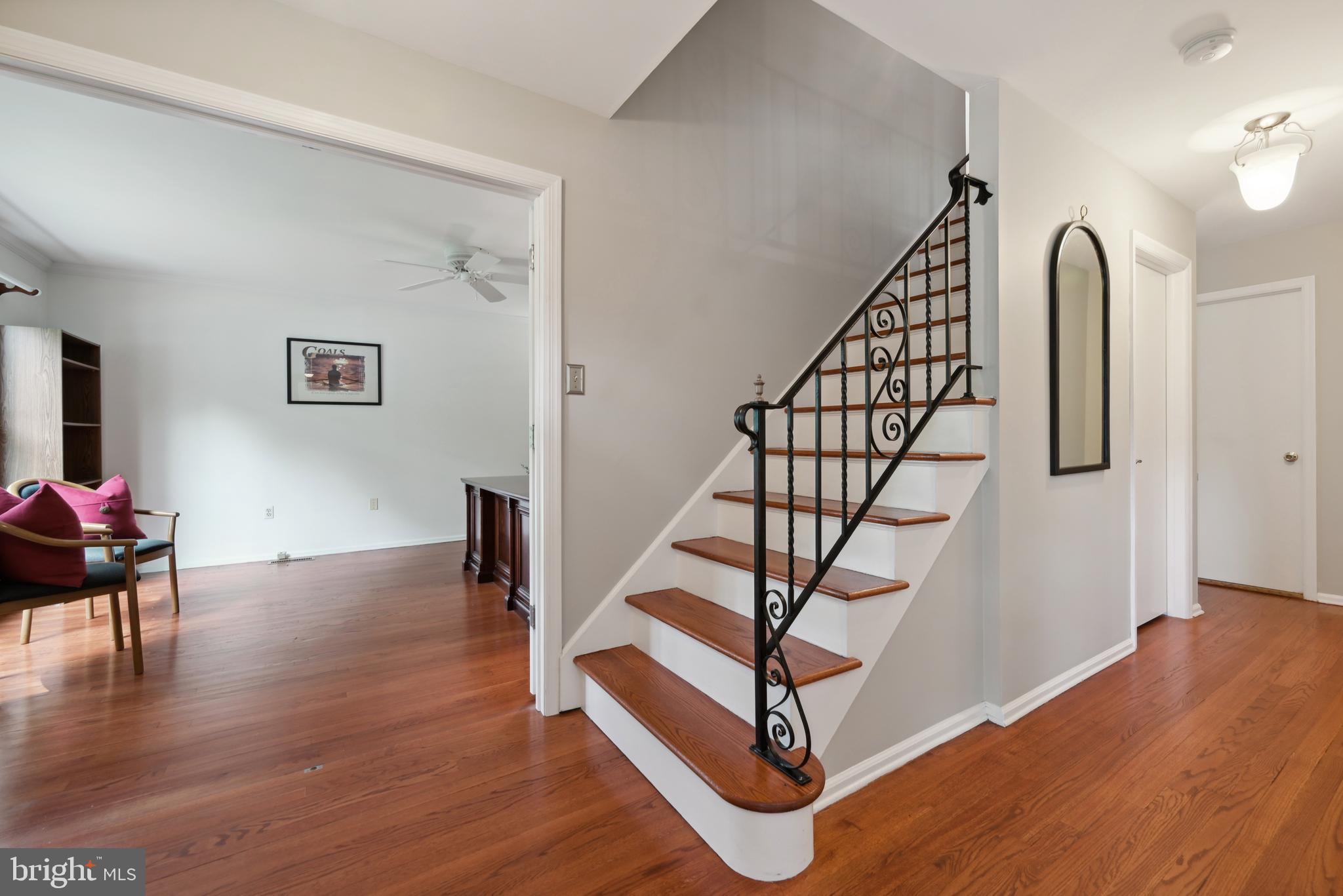 16 Fieldston Road West Windsor, NJ 08550 - Photo 4 of 34 a view of entryway with wooden floor and stairs